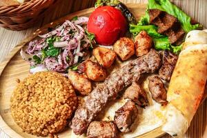 Appetizing Plate of Meat, Rice, and Vegetables photo