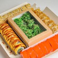 Plate of Carrots, Rice, and Assorted Foods photo