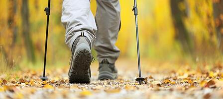 AI generated Active person in hiking shoes using hiking sticks, walking through forest with space for text photo