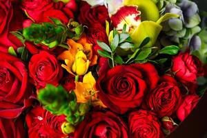 Bouquet of Red Roses and Flowers photo