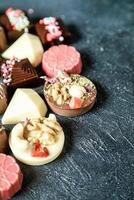 Assorted Chocolates Arranged on a Table photo