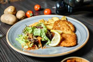 Deliciously Prepared Plate of Food on a Table photo