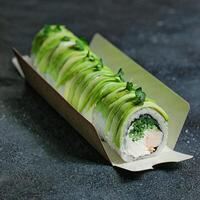 Fresh Sushi Roll on White Plate on Wooden Table photo