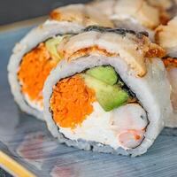 Close Up of a Sushi Roll on a Plate photo