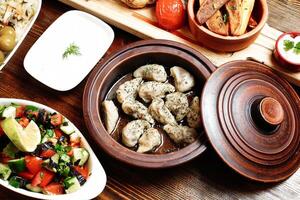 Wooden Table With Assorted Food Bowls photo