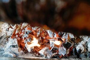 Close-Up of Intense Flames in a Grill photo