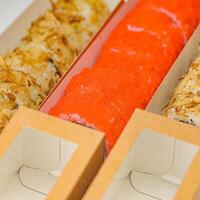 Three Boxes Containing Different Types of Food photo