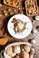 Wooden Table With Plates of Food photo