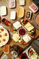 Wooden Table With Platters of Food photo