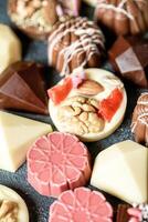 Assorted Chocolates Displayed on a Table photo