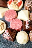 Assorted Chocolates Arranged on a Table photo