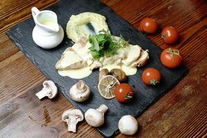 Delicious Plate of Food on Solid Wooden Table photo