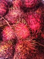 Rambutans in the traditional market photo