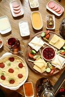 Wooden Table Adorned With Plates of Food photo