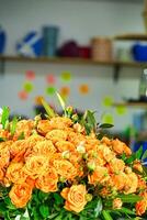 Vibrant Orange Roses Adorning Table, Copy Space photo