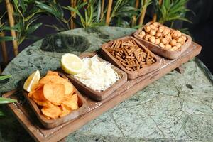 Table With Plates of Food and Skull Mask photo