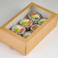 Box of Sushi on Table photo