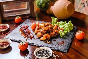 Wooden Table Displaying Assorted Bowls of Food photo