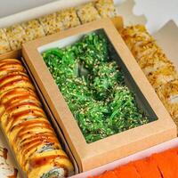 Close-Up of Delicious Food in Box on Table photo