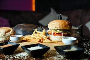 Burger and French Fries on Table photo