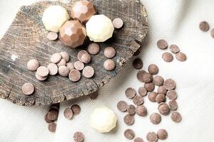 Chocolate and Marshmallows on a Wood Slice photo