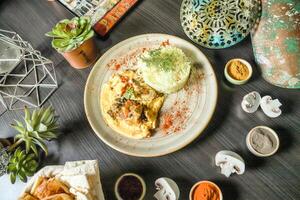 Plate of Food on Wooden Table photo