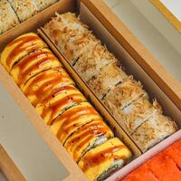 Assorted Food Box Filled With Various Types of Delicious Cuisine photo