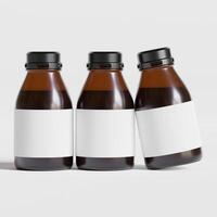 Medicine bottle of brown glass isolated on white background with clipping path. Cough syrup, mock-up 3D rendering illustration photo