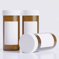 3D rendering of a set of empty labeled medical pill bottles brown color and realistic texture photo