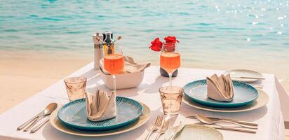 Luxury breakfast table beautiful tropical sea sky background. Idyllic romantic morning love couples time at summer holiday. Honeymoon romance vacation concept. Travel and lifestyle, destination dining photo