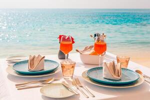 Luxury breakfast table beautiful tropical sea sky background. Idyllic romantic morning love couples time at summer holiday. Honeymoon romance vacation concept. Travel and lifestyle, destination dining photo