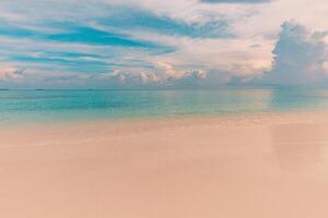 Closeup sea sand beach. Panoramic beach landscape. Inspire tropical beach seascape horizon. Majestic sunset sky reflection calm tranquil relaxing sunlight summer mood. Mediterranean seaside vacation photo