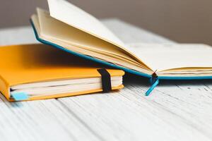 Notebook diary for planning in blue and yellow. photo