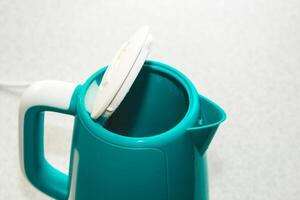 Close-up of an electric kettle that heats water, scum from water. photo