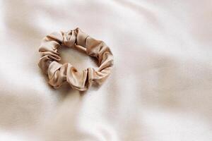 Silk smooth shiny scrunchie for safe hair care photo