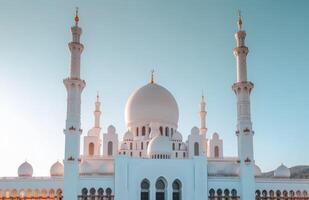 AI generated White mosque with blue sky, mosques picture photo