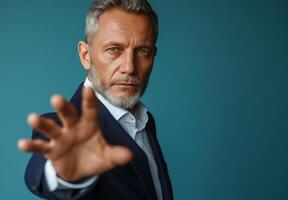 AI generated Professional businessman showcasing his hand on a blue backdrop, brand launch picture photo