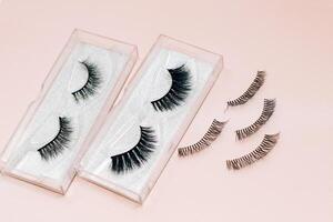 False decorative eyelashes on a white background photo