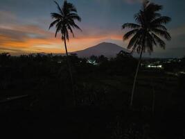 A view at dusk, when the sun is about to set photo