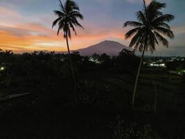 A view at dusk, when the sun is about to set photo
