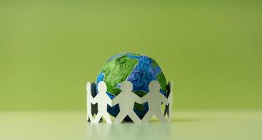 World Earth Day Concept. Green Energy, ESG, Renewable and Sustainable Resources. Environmental Care. Paper Cut as Group of People  Embracing a Green Globe. Protecting Planet Together. Top View photo