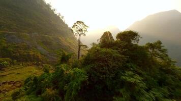 Aerial view of a valley in the mountains at sunset, Vietnam video