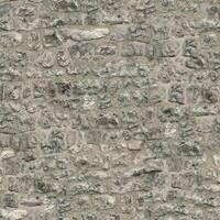 Old wall stone texture and background with rustic tiles design photo