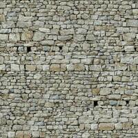 Old wall stone texture and background with rustic tiles design photo