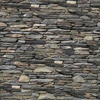 Old wall stone texture and background with rustic tiles design photo