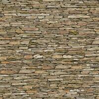 Old wall stone texture and background with rustic tiles design photo