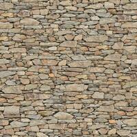 Old wall stone texture and background with rustic tiles design photo