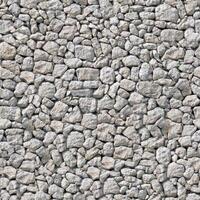 Old wall stone texture and background with rustic tiles design photo