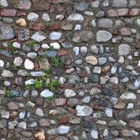 Old wall stone texture and background with rustic tiles design photo