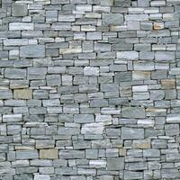 Old wall stone texture and background with rustic tiles design photo